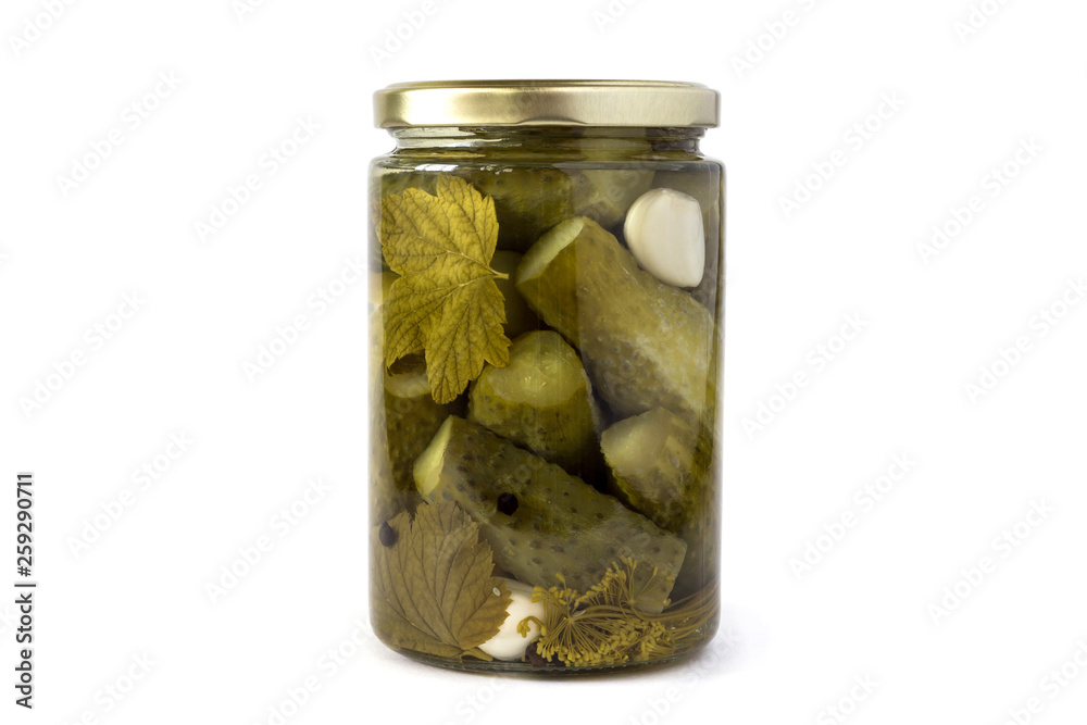 Pickles - fermented pickled cucumbers isolated on white. Homemade sour marinated cucumbers in a glass jar