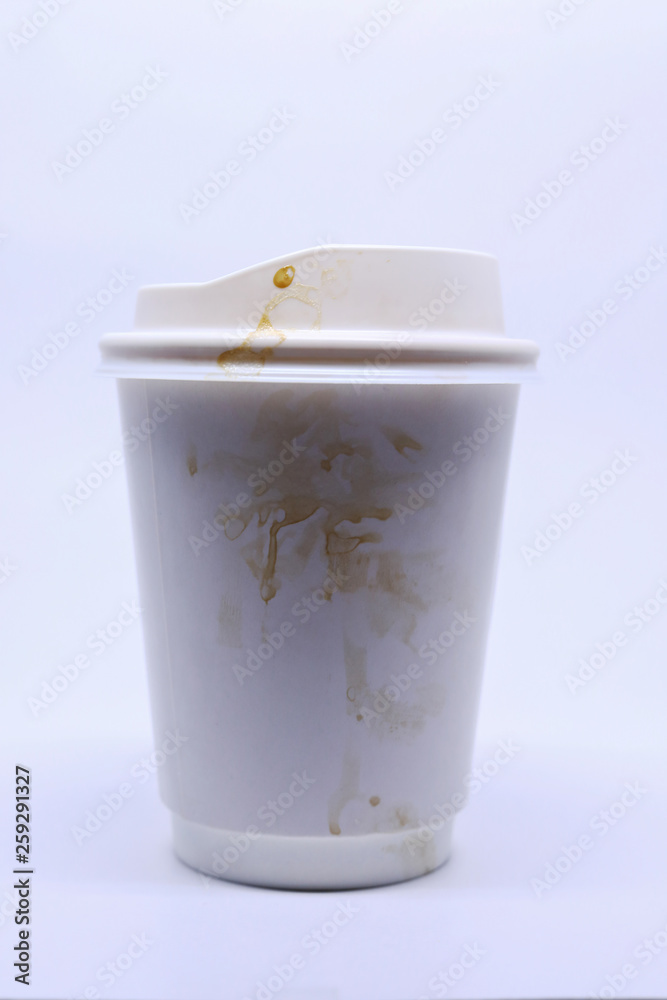 dirty brown stain on take away cup for hot coffee drink, paper mug on white background dirty brown stain on take away cup for hot coffee drink, paper mug on white background