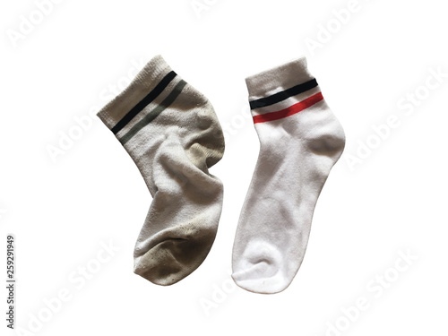 Used and new soft socks isolated on white background