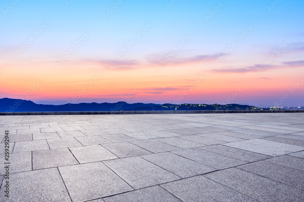 Empty square floor and beautiful mountain nature landscape at sunset