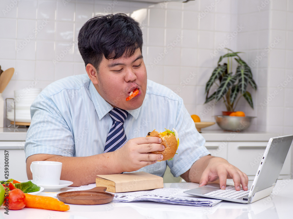 Diet failure of fat man eating fast food unhealthy hamberger. Diet failure of fat man eating fast food unhealthy hamberger.