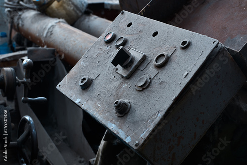 old rusty dirty machines and mechanisms in an abandoned factory