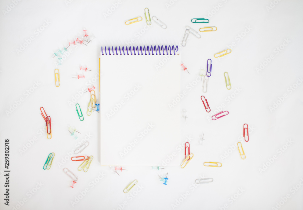 Bright stationery for study: paper, felt-tip pens, scissors, paper clips Bright stationery for study: paper, felt-tip pens, scissors, paper clips