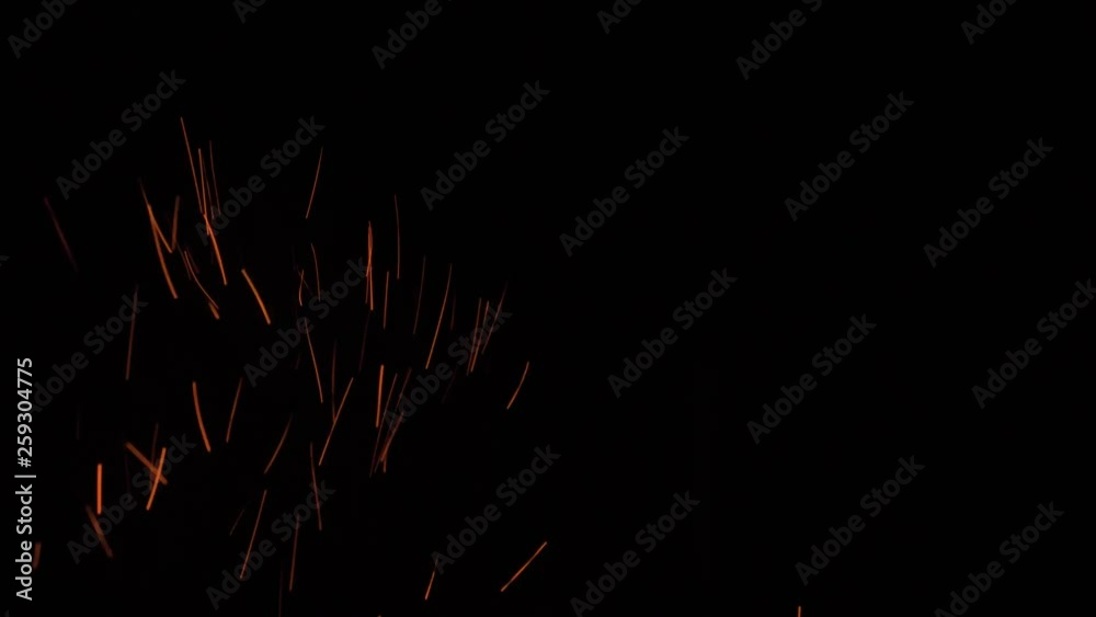 Sparks From The Fire Fly Up Against The Black Sky At Night Sparks From The Fire Fly Up Against The Black Sky At Night