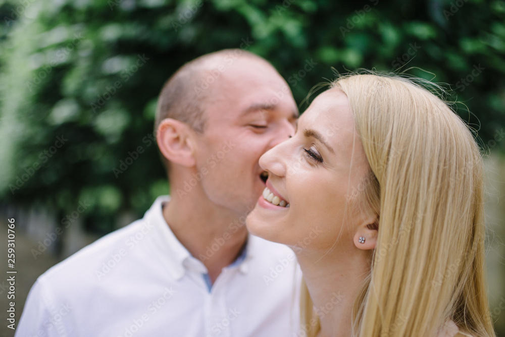 Head shot happy millennial young man and woman hugging embracing indoors. Portrait close up smiling husband and wife piggyback ride looking at camera laughing. Dating and romantic relationship concept Head shot happy millennial young man and woman hugging embracing indoors. Portrait close up smiling husband and wife piggyback ride looking at camera laughing. Dating and romantic relationship concept