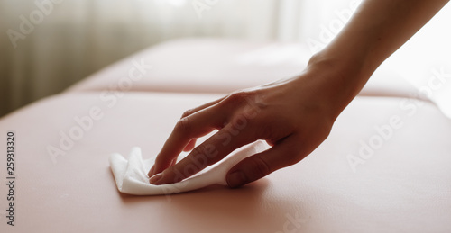 Wallpaper Mural Close up hand with white cloth cleaning on rose wall Torontodigital.ca