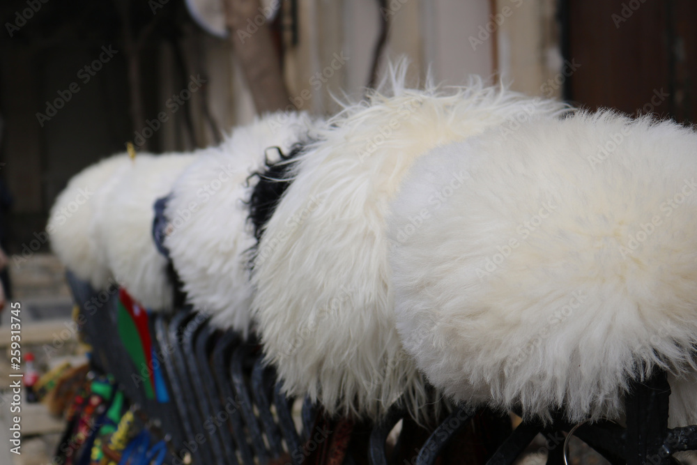 Sheep hats in market on the street in Old city Icheri Sheher in Baku. Azerbaijan Sheep hats in market on the street in Old city Icheri Sheher in Baku. Azerbaijan