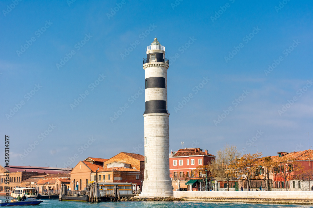 Italy, Venice, Murano, view of the harbor lighthouse.