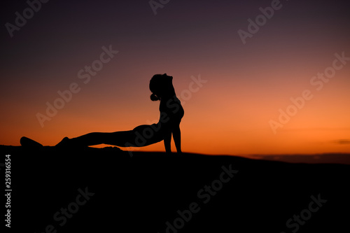 Yogi Master Silhouette on the beach © jacojvr