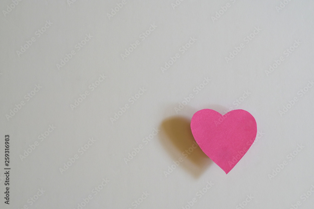 Love concept: Paper heart shape on white background