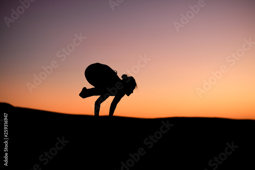 Yogi Master Silhouette on the beach