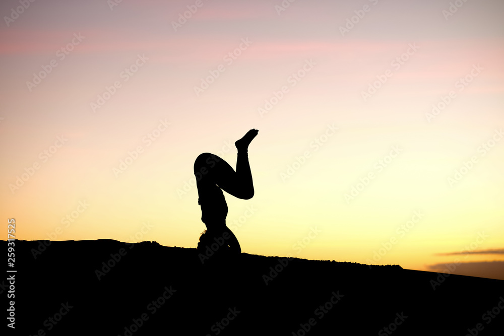 Fantastic moves from a yoga instructor make for fantastic silhouettes