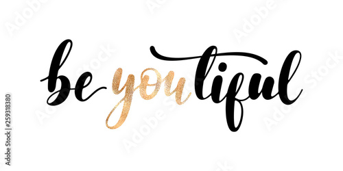 BeYOUtiful - Handwritten lettering with black and golden letters isolated on a white background. A contemporary vector design featuring a motivational quote.