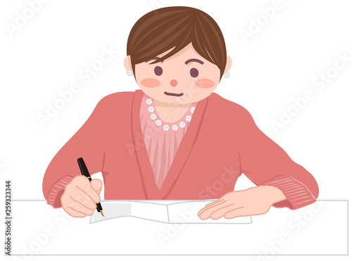 文字を書く女性