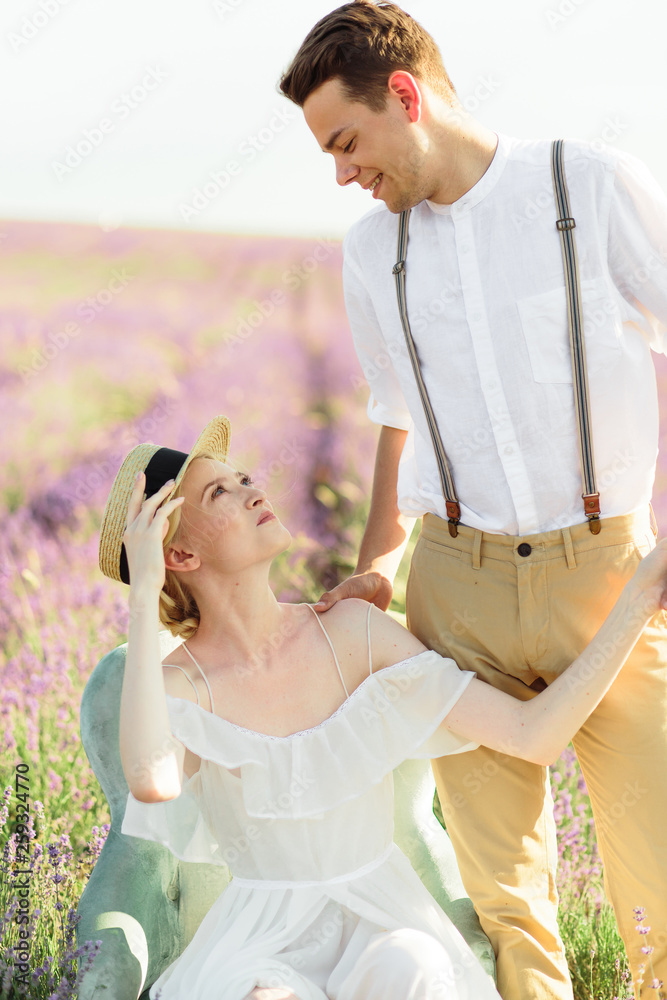 Beautiful portrait of bride and groom in lavender field