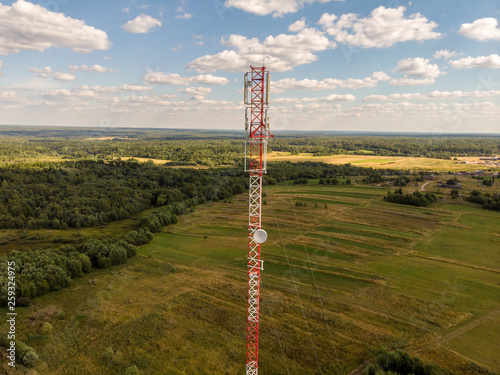 Cell tower in the forest, view from the drone photo