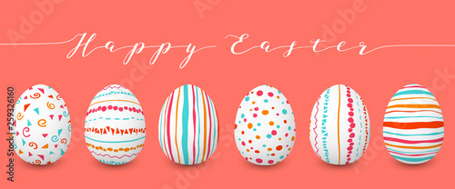 Happy Easter eggs set in a row copyspace. Colorful easter eggs on coral background. hand font. Abstract ornaments.