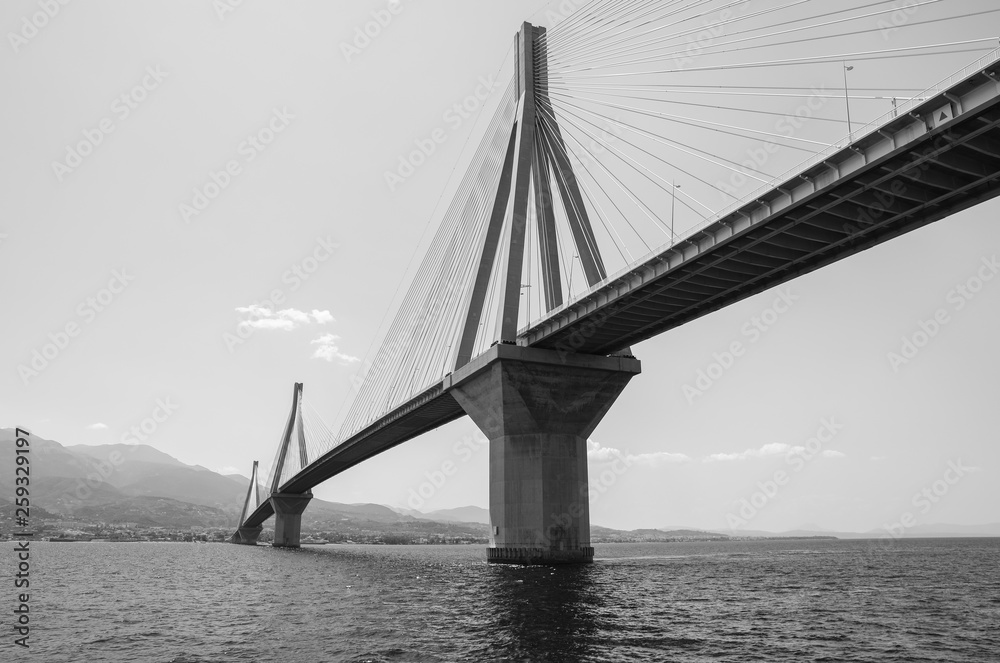 Fototapeta premium The Rio Antirrio Bridge or Charilaos Trikoupis Bridge, photo taken from the boat during summer holidays 2018.