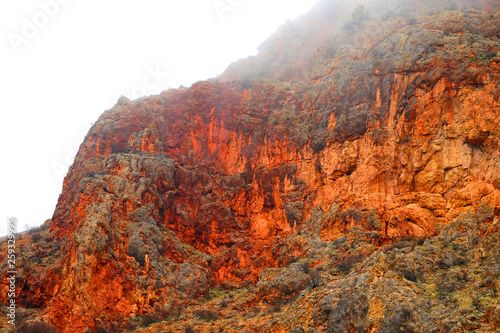 Photo of beautiful fiery red mountains and rocks