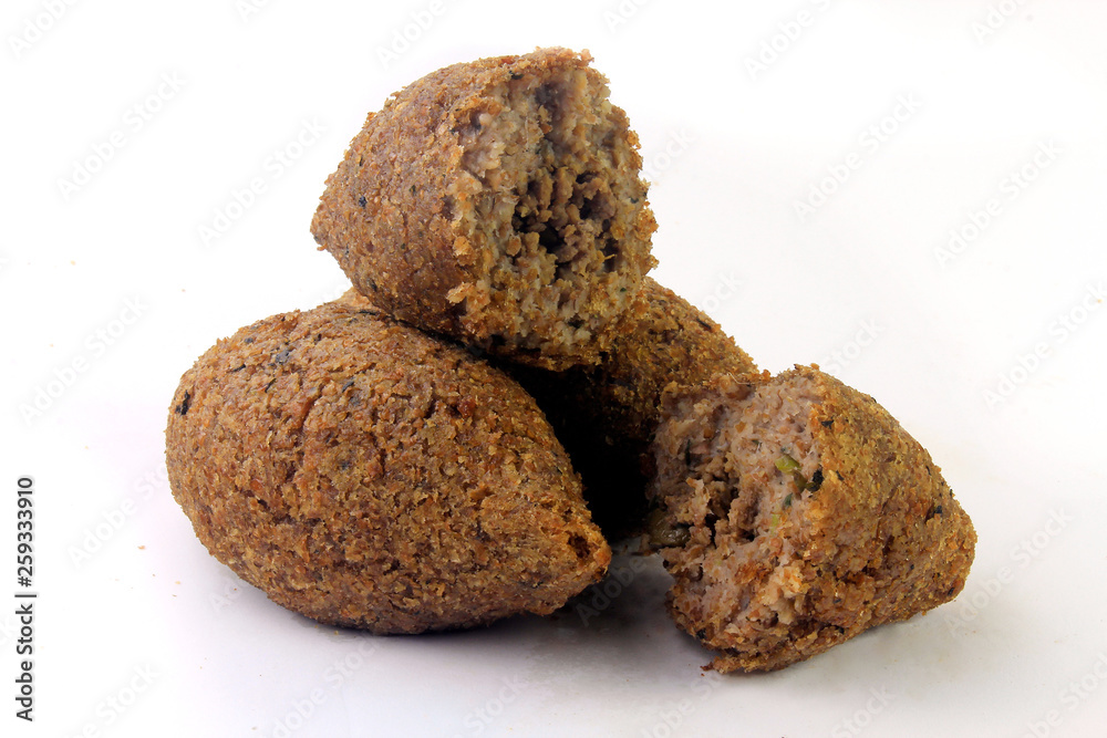 kibbeh traditional Lebanese cuisine food, isolated on white background kibbeh traditional Lebanese cuisine food, isolated on white background