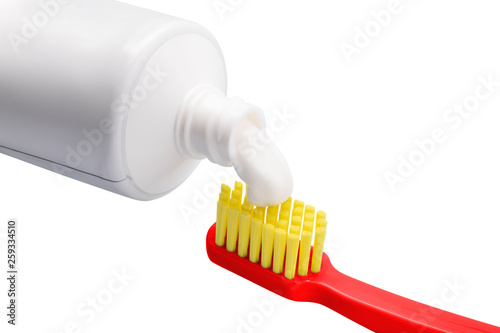 toothbrush and toothpaste  isolated on white
