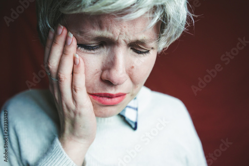 Middle age woman suffering pain