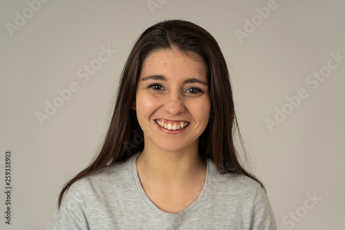 Portrait of young attractive cheerful woman with smiling happy face. Human expressions and emotions