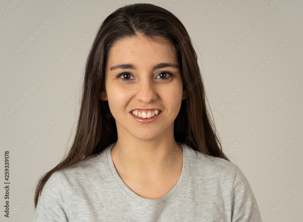 Portrait of young attractive cheerful woman with smiling happy face. Human expressions and emotions Portrait of young attractive cheerful woman with smiling happy face. Human expressions and emotions