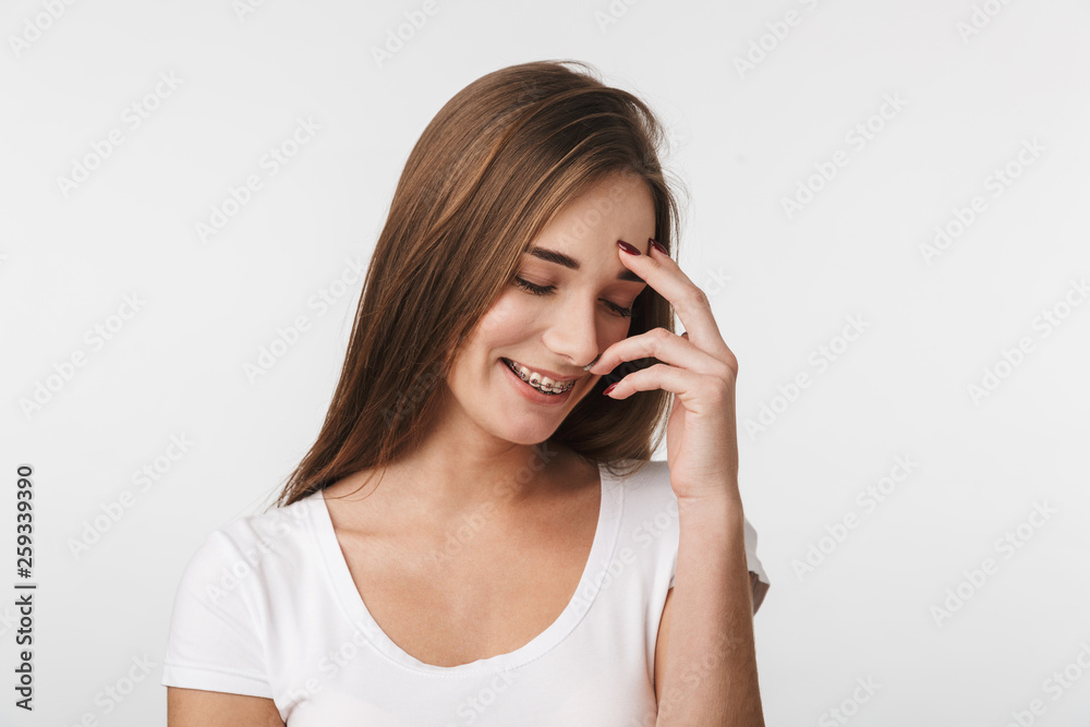 Attractive young woman standing isolated Attractive young woman standing isolated