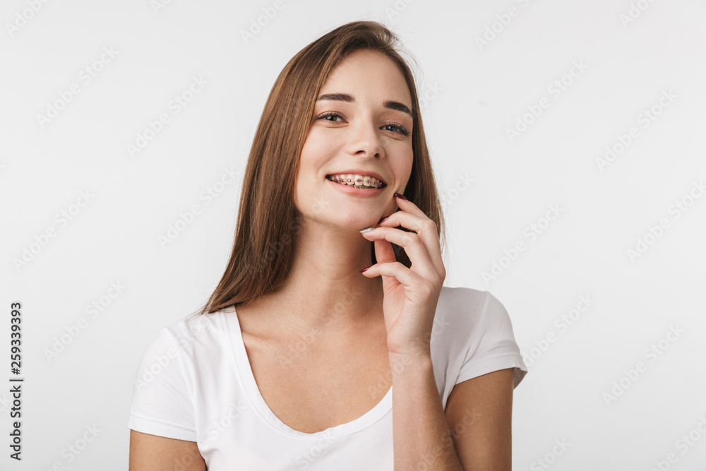Attractive young woman standing isolated Attractive young woman standing isolated