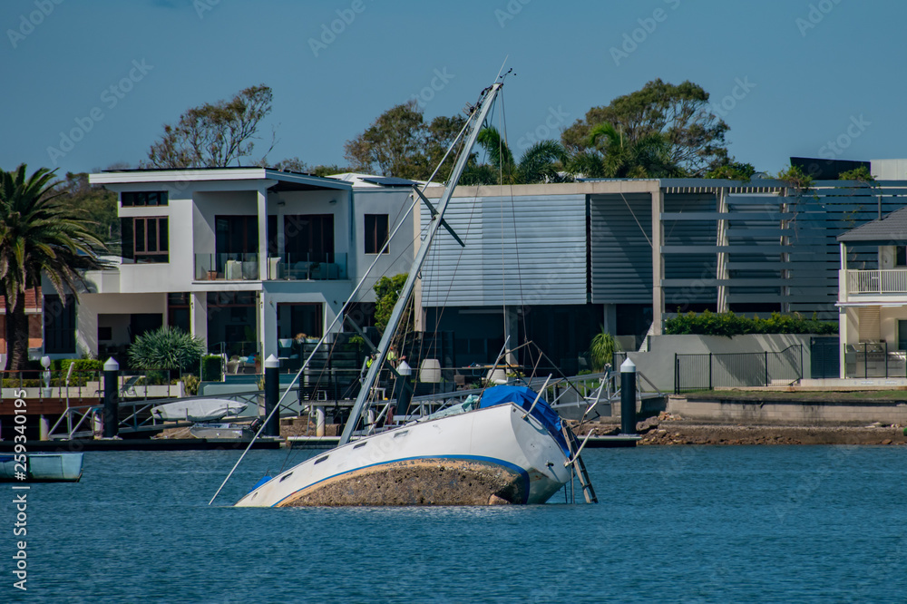 Fototapeta premium A yacht in Mooloolaba suffered during a storm and partially sunk