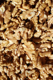 Walnuts. Peeled walnuts background texture. Walnut wallpaper. Kernel