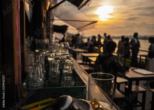 Photography Empty glass At sunset, on the table with space for preparing for the party Along the Mekong River