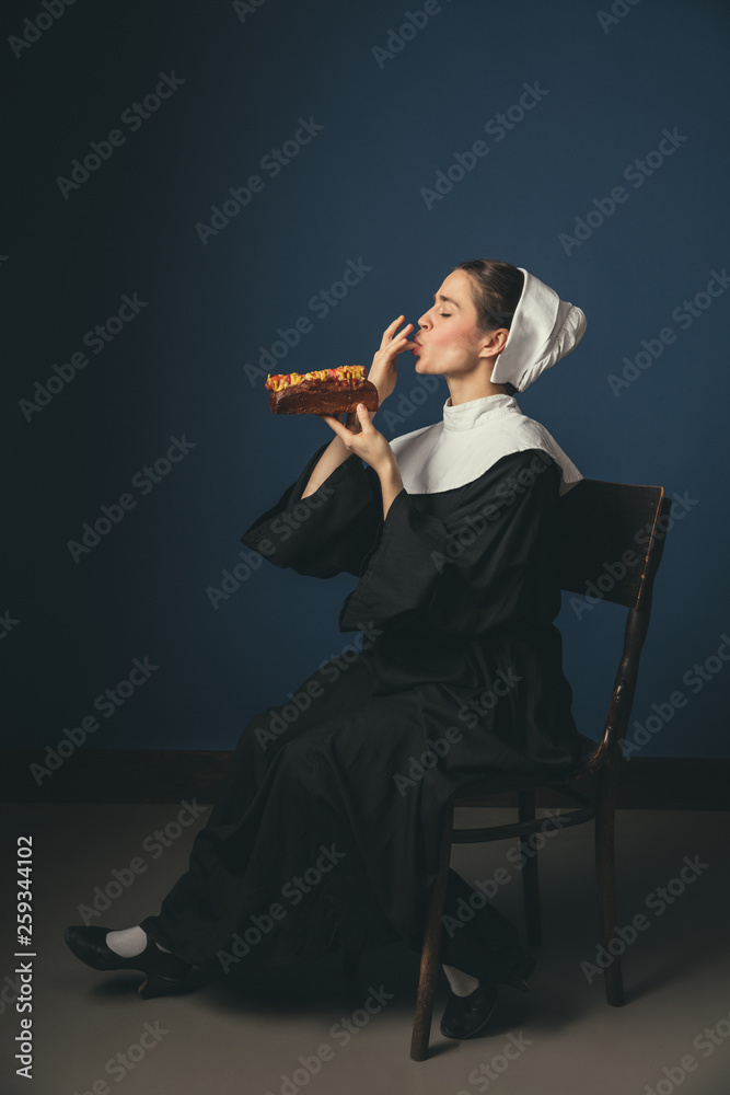Fototapeta premium Medieval young woman as a nun
