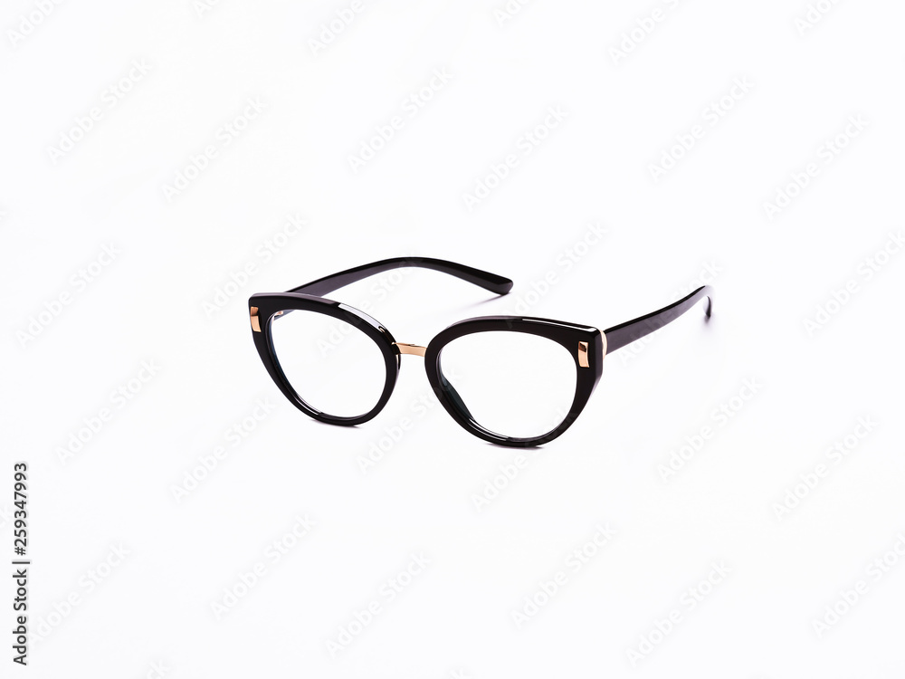 Glasses with transparent glasses in a fashionable frame on an isolated white background Glasses with transparent glasses in a fashionable frame on an isolated white background