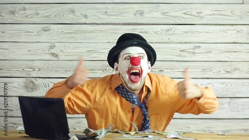 Clown businessman and money