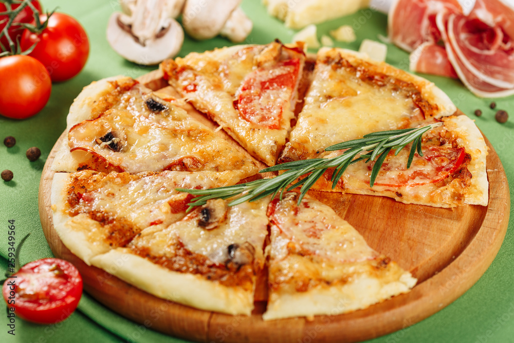 Italian Pepperoni Pizza with Ham Closeup Side View