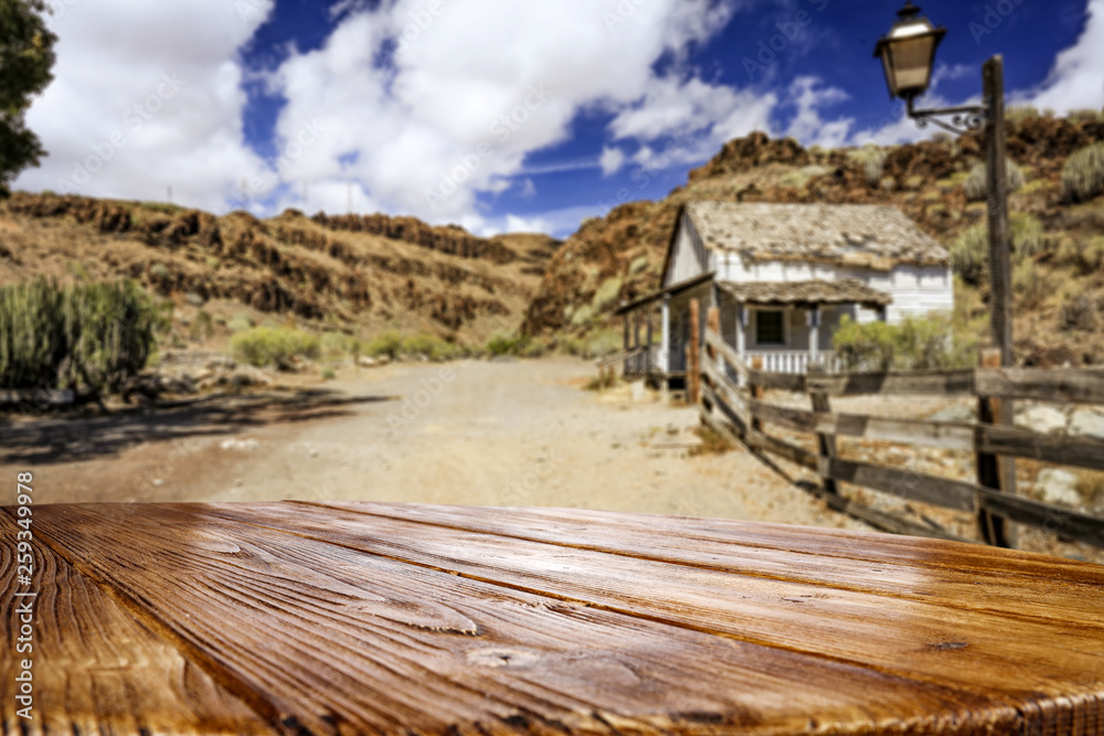 Wooden old table of free space for your decoration and Wild West background. Wooden old table of free space for your decoration and Wild West background.