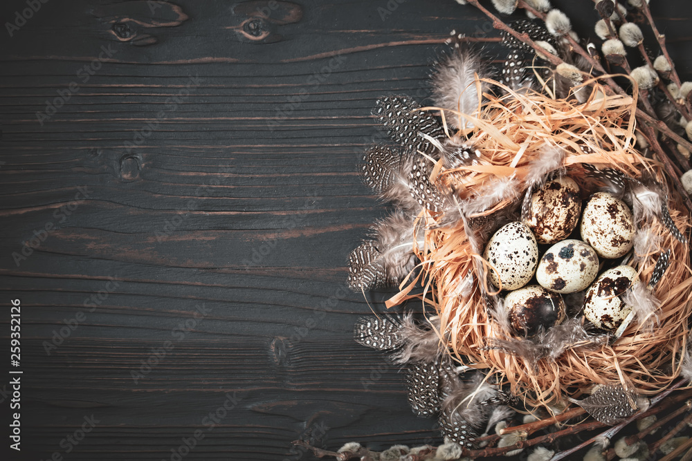 Quail eggs on old wooden background. Happy Easter. Top view. Free copy space. Selective focus. Quail eggs on old wooden background. Happy Easter. Top view. Free copy space. Selective focus.