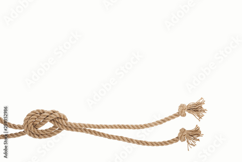 nautical brown and twisted ropes with sea knot isolated on white