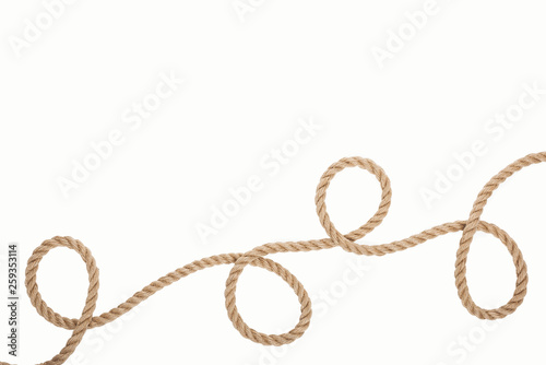 long and brown rope with curls isolated on white
