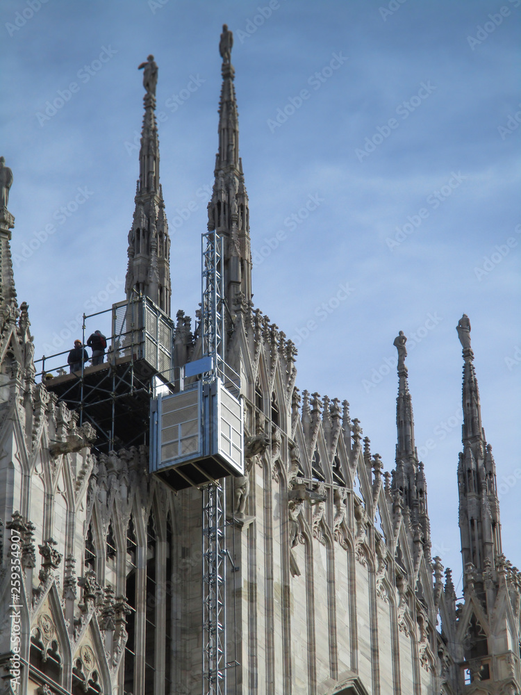 Milan, Duomo, the cathedral of the city during repairing work - obrazy, fototapety, plakaty 