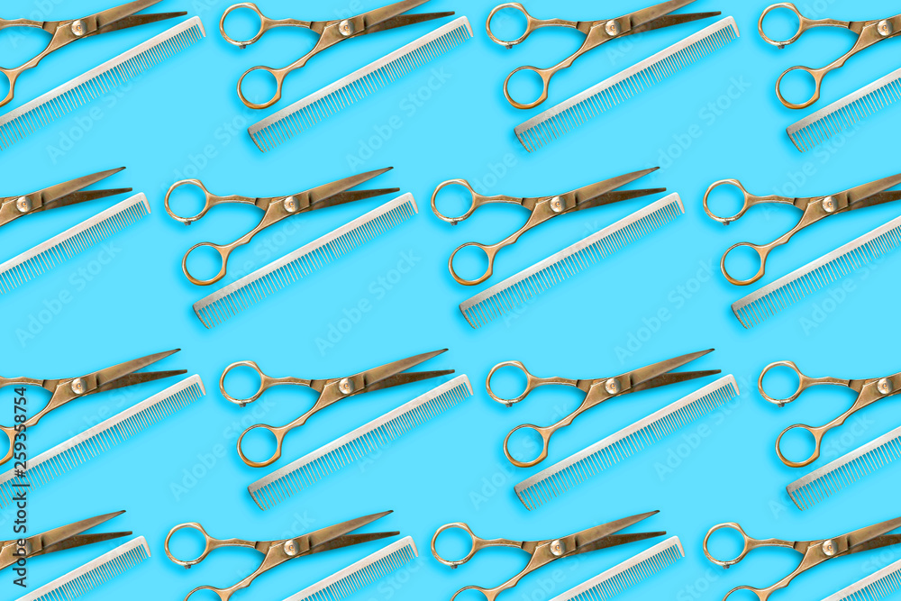 Barber shop background. Hairdressing scissors and comb on a blue background. Beauty and fashion background. Barber shop background. Hairdressing scissors and comb on a blue background. Beauty and fashion background.