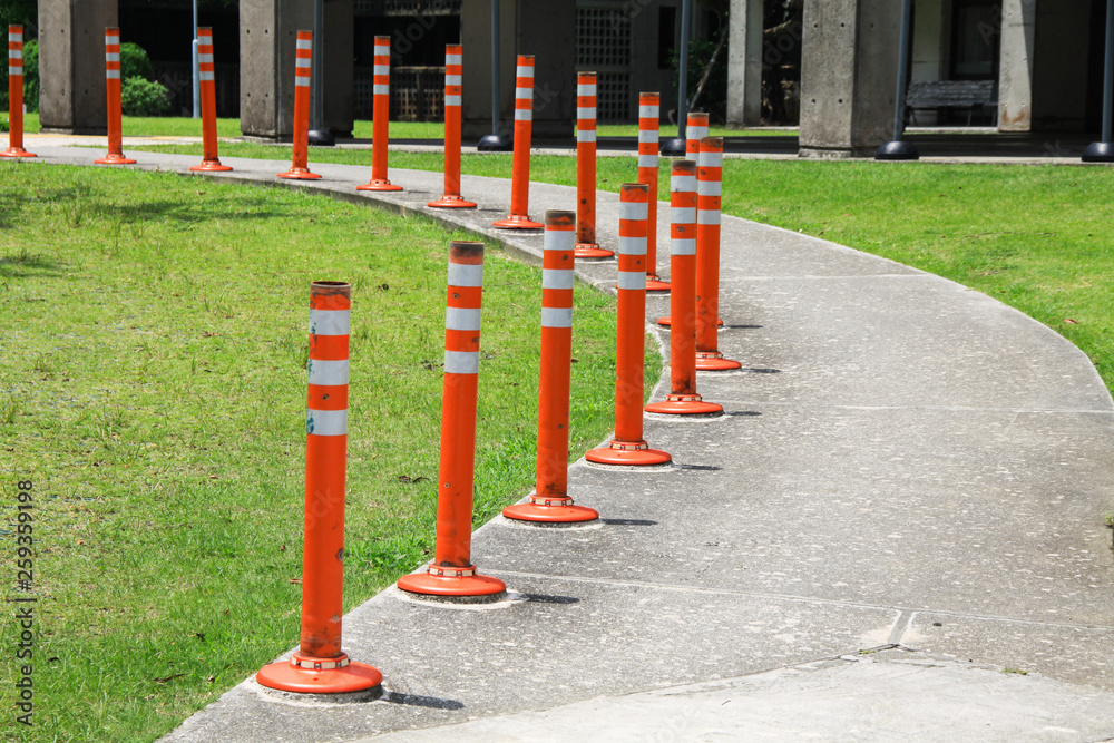 safety bollards on walkway, Barrier for road, sidewalk and Different  pavement, Concept image for urban and landscape design. Stock Photo | Adobe  Stock