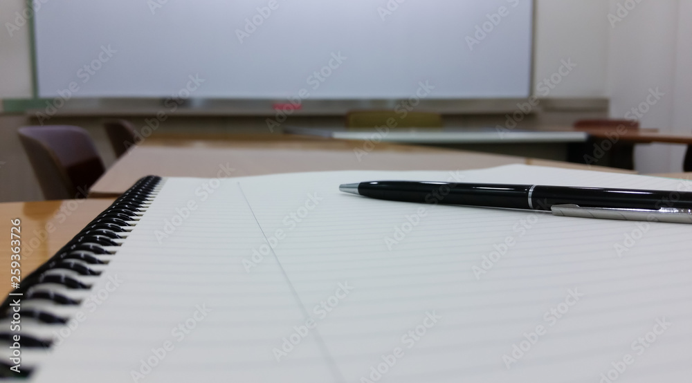 Notebook and Pen. Learning, Education and School Concept. Seminar Classroom for Skills Development. Writer Business Meeting. Conference Room. Student, Teacher, or Tutor Writing Ballpointpen.