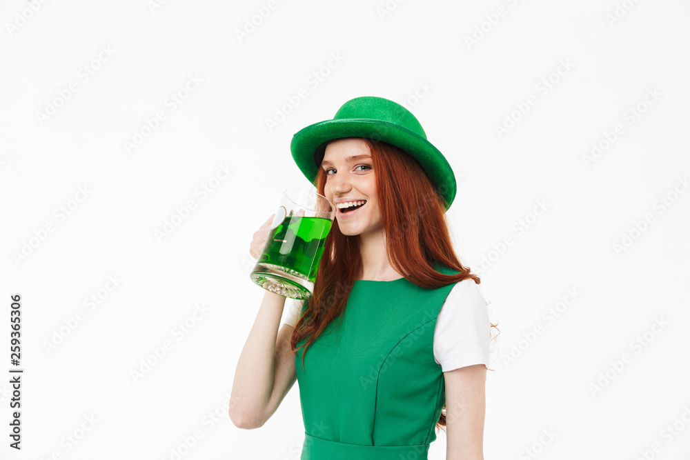 Happy young redheaded girl wearing green hat Happy young redheaded girl wearing green hat
