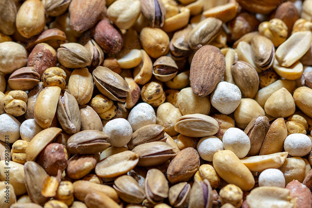 Organic mixed nuts as background, top view