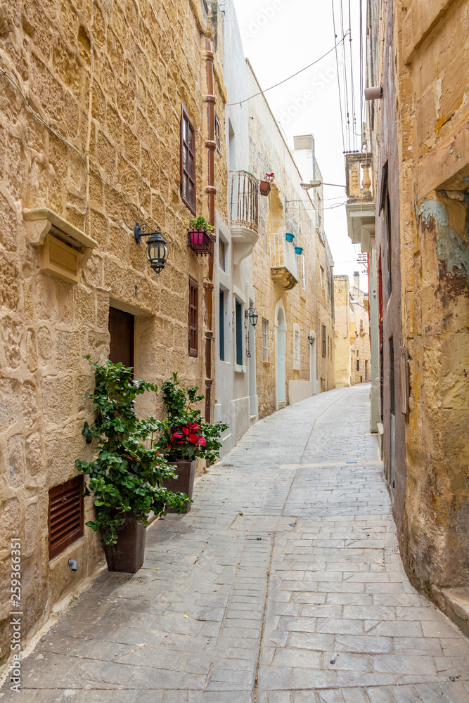 Beautiful typical narrow street in Rabat, Malta, streetscape detail