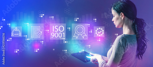 ISO 9001 with woman using a tablet