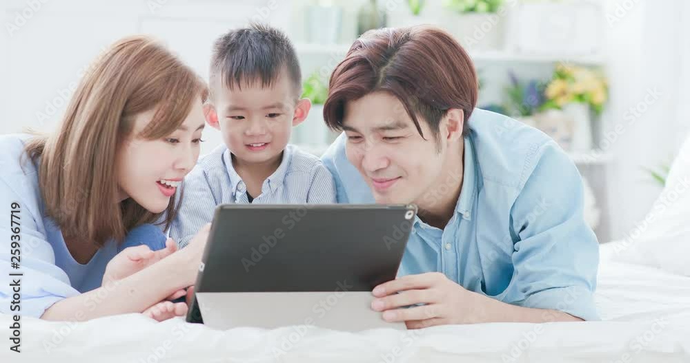 Parent play with child by tablet Parent play with child by tablet